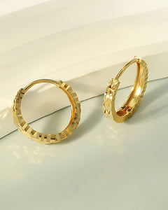 Faceted gold hoop earrings minimalist luxury design