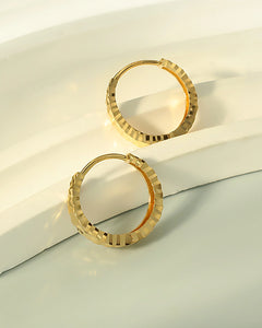 Faceted gold hoop earrings minimalist luxury design