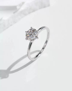 Single solitaire moissanite ring artistic shadow photography