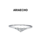 AriaEcho three-stone V-shaped moissanite ring front view