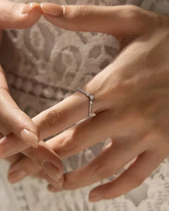 Moissanite crown ring on hand – lifestyle image