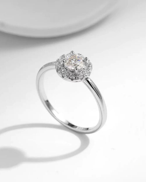 Side angle of halo moissanite ring – sterling silver band