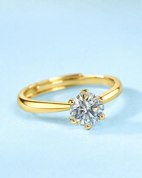 18K yellow gold classic solitaire moissanite ring angled view