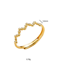 Beaded adjustable gold ring size and width detail