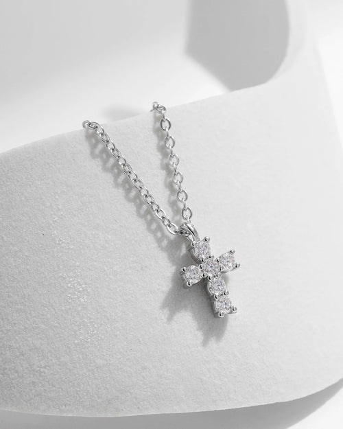 Design inspiration for dainty moissanite cross necklace