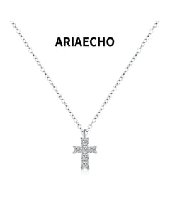 Dainty moissanite cross necklace in 925 sterling silver