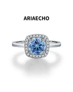 Blue Round Moissanite Halo Ring in 925 Sterling Silver Front View