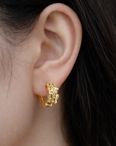 Textured geometric gold huggie earrings with crystal accents