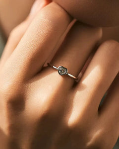 heart cut moissanite ring worn on hand (natural light)