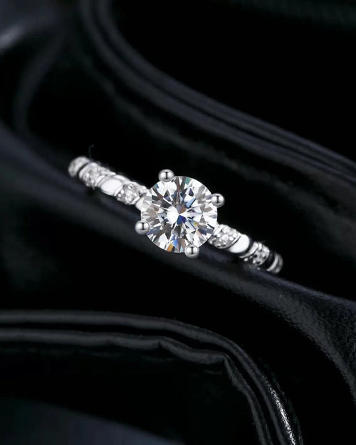 Front view of twisted solitaire moissanite engagement ring