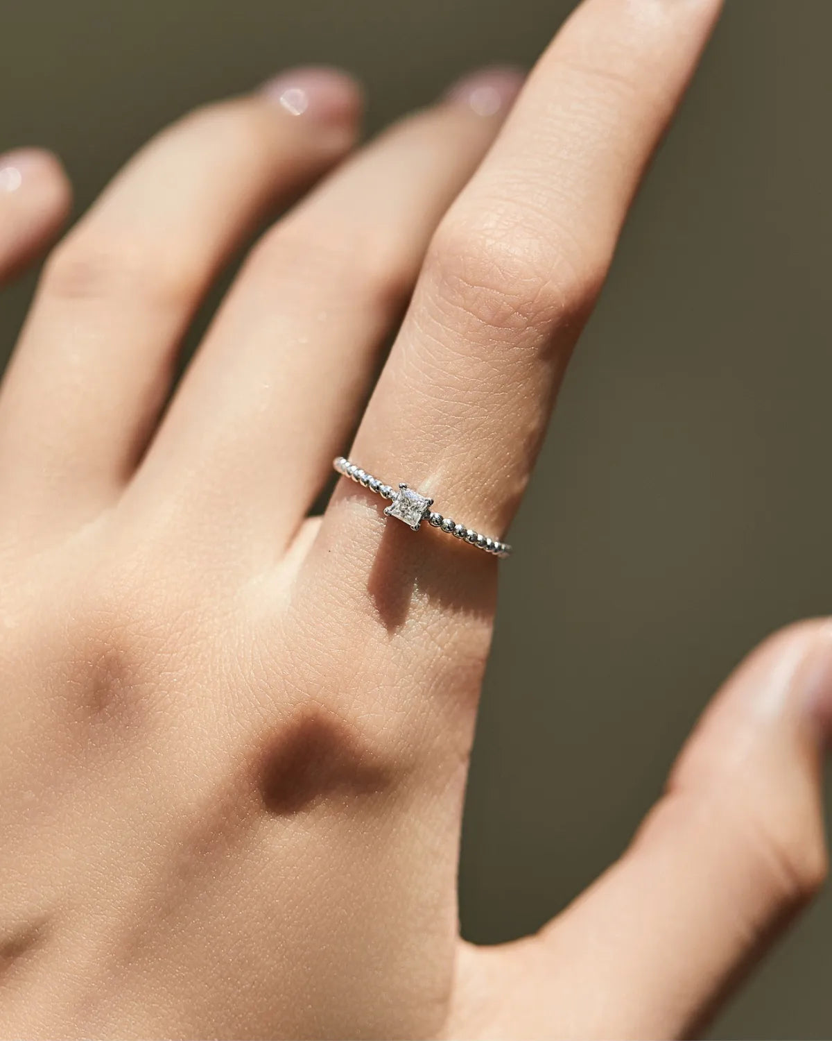 3mm moissanite beaded ring in silver