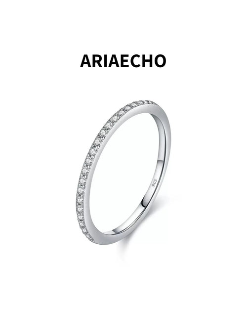 Dainty moissanite pavé ring in sterling silver