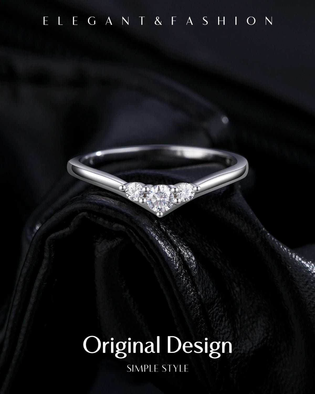 Elegant V-shaped moissanite ring on black background