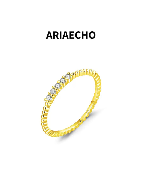 Gold moissanite stacking ring with five stones