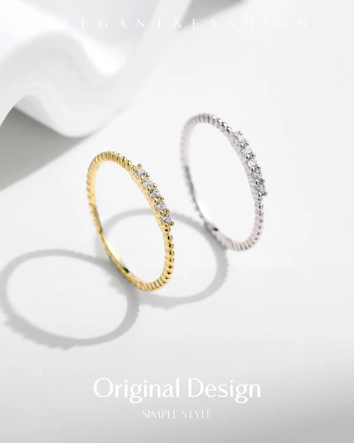 Moissanite stacking rings displayed in soft studio lighting