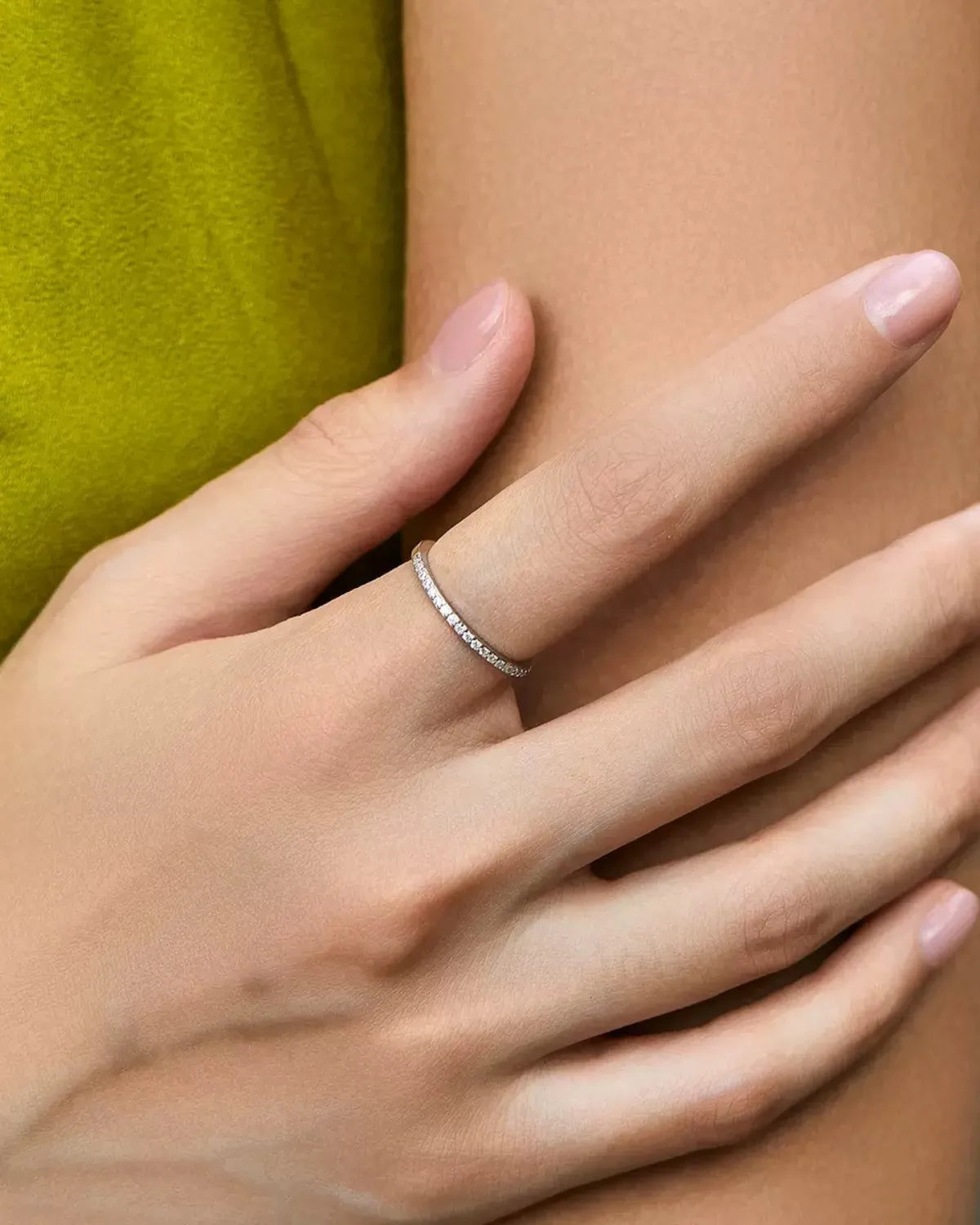 Pavé moissanite ring worn on han