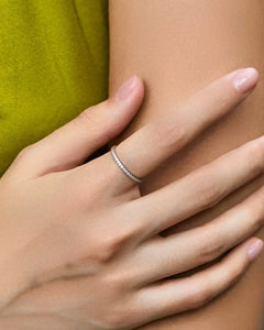 Pavé moissanite ring worn on han