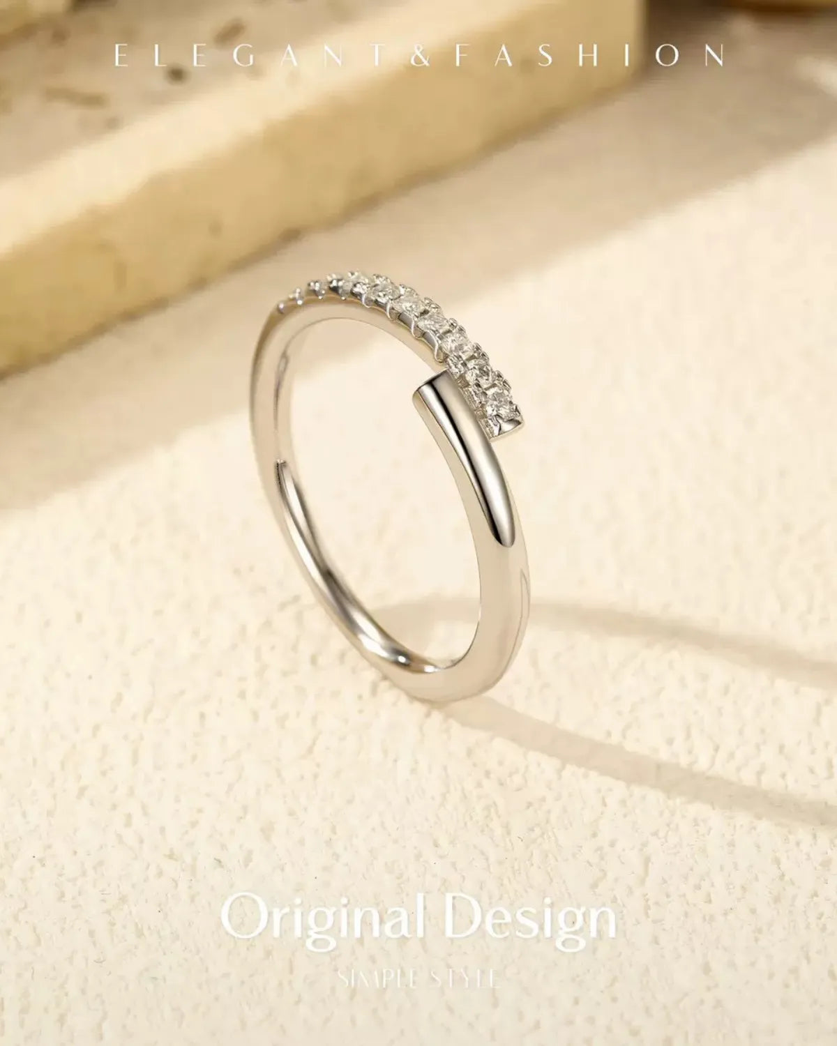 Silver Open Band Moissanite Ring on Light Background