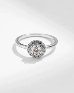 Silver halo engagement-style ring with 0.5ct moissanite