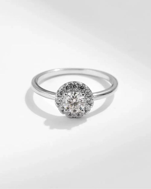 Silver halo engagement-style ring with 0.5ct moissanite
