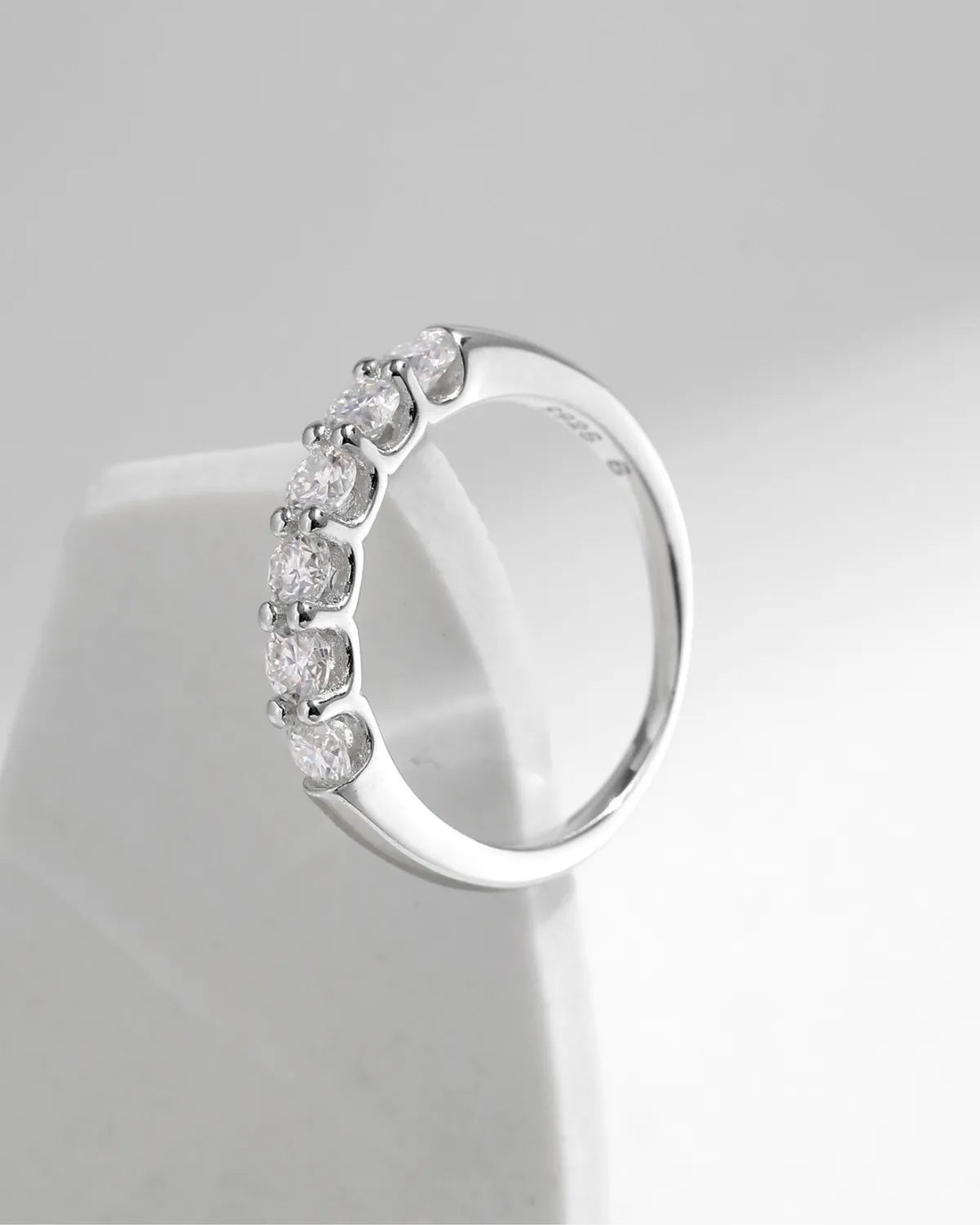 Six-Stone Moissanite Band Ring – angled side view of stones