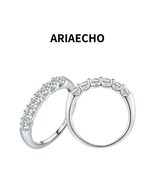 Six-Stone Moissanite Band Ring – double ring display with six moissanite stones