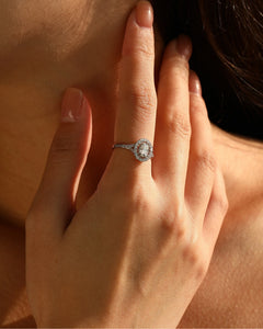 Sterling silver oval halo moissanite ring with side stones