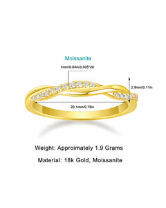 18k gold pavé moissanite twist ring flat lay on soft neutral background