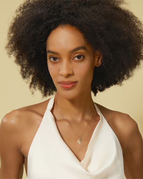 Layered constellation necklace styling – gold-plated silver