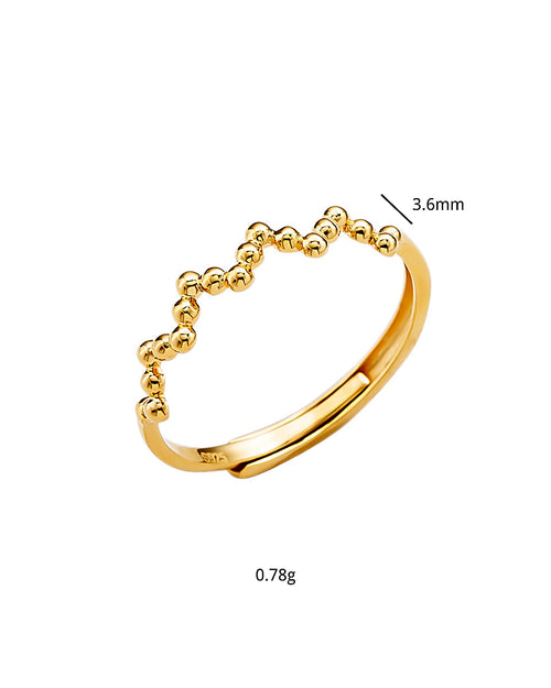 Beaded adjustable gold ring size and width detail