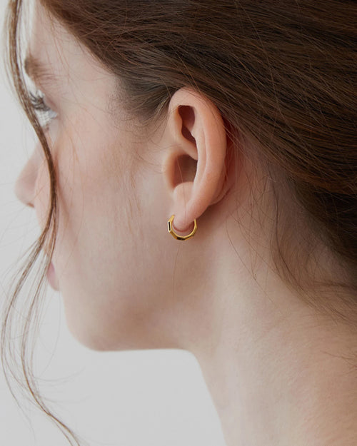 Small gold huggie earrings 10mm side view modern dainty hoop style