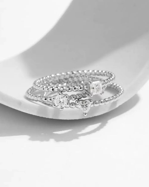 beaded moissanite rings stacked together