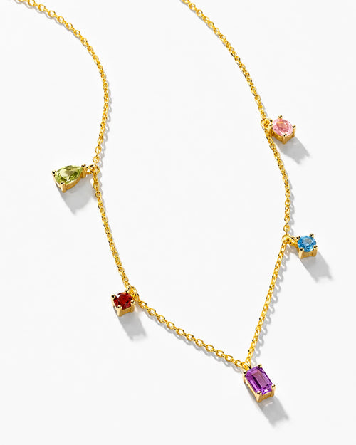 Angled view of a natural amethyst dopamine gemstone necklace with colorful natural gemstones.