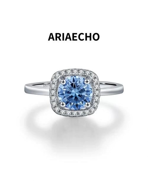 Blue Round Moissanite Halo Ring in 925 Sterling Silver Front View