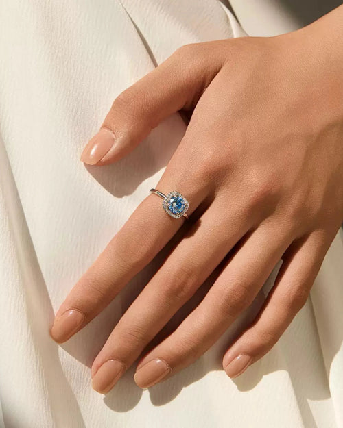 Blue Round Moissanite Halo Ring Worn on Hand