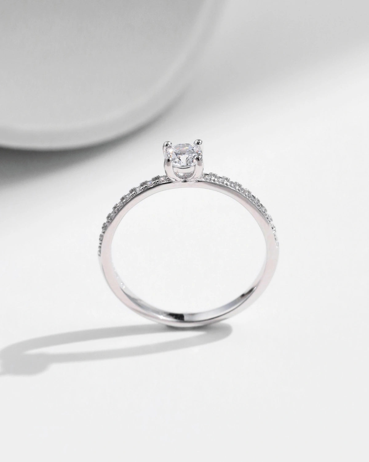 close-up pavé band moissanite ring