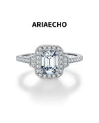 1ct emerald cut halo moissanite engagement ring in 925 sterling silver front view