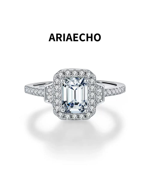 1ct emerald cut halo moissanite engagement ring in 925 sterling silver front view