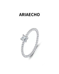 minimalist beaded band moissanite ring