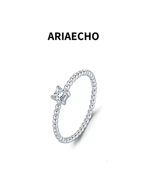 minimalist beaded band moissanite ring