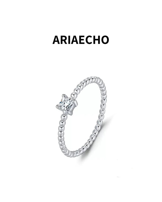 minimalist beaded band moissanite ring