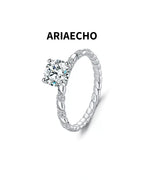 Twisted solitaire moissanite ring in 925 sterling silver