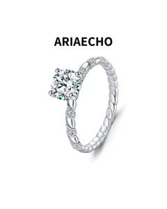 Twisted solitaire moissanite ring in 925 sterling silver